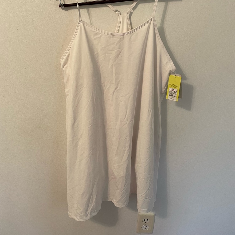 Size XL womens activewear 1 peice dress new with tags retails $30 has shorts
